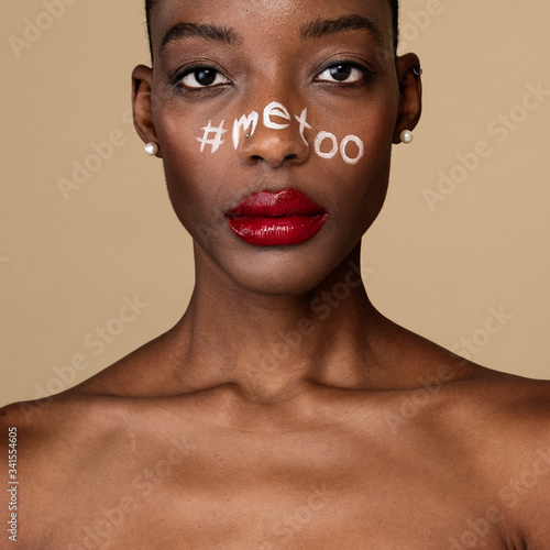 Hashtag metoo on an African American woman's face photo