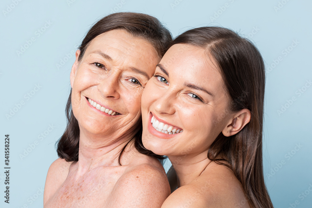 Happy mother and daughter hugging Happy mother and daughter hugging