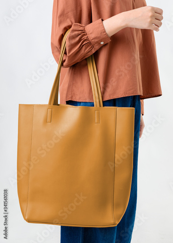 Woman with floral tote bag mockup