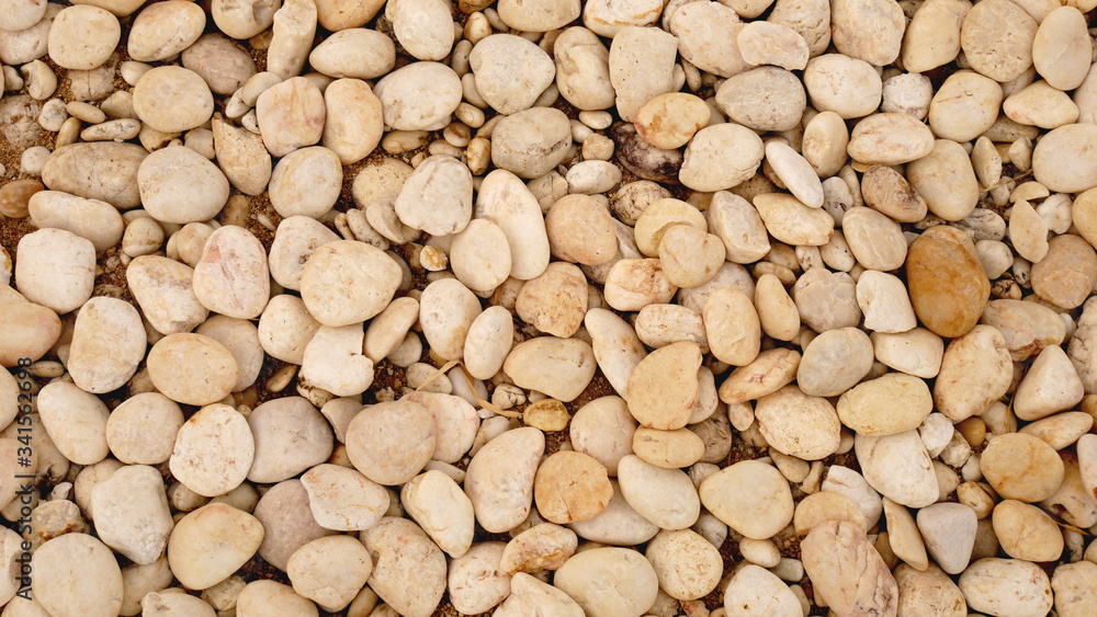 pile of stones nature background. white pebble beach pile of stones nature background. white pebble beach