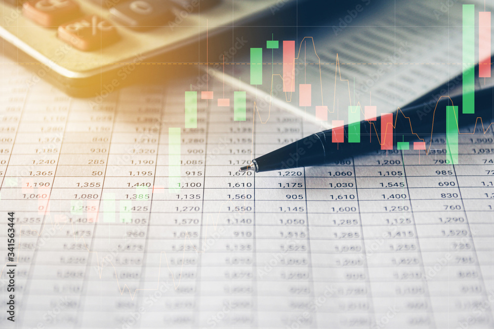 Pen and Calculator on accounting report with trading graph, Business and Financial concept. Pen and Calculator on accounting report with trading graph, Business and Financial concept.