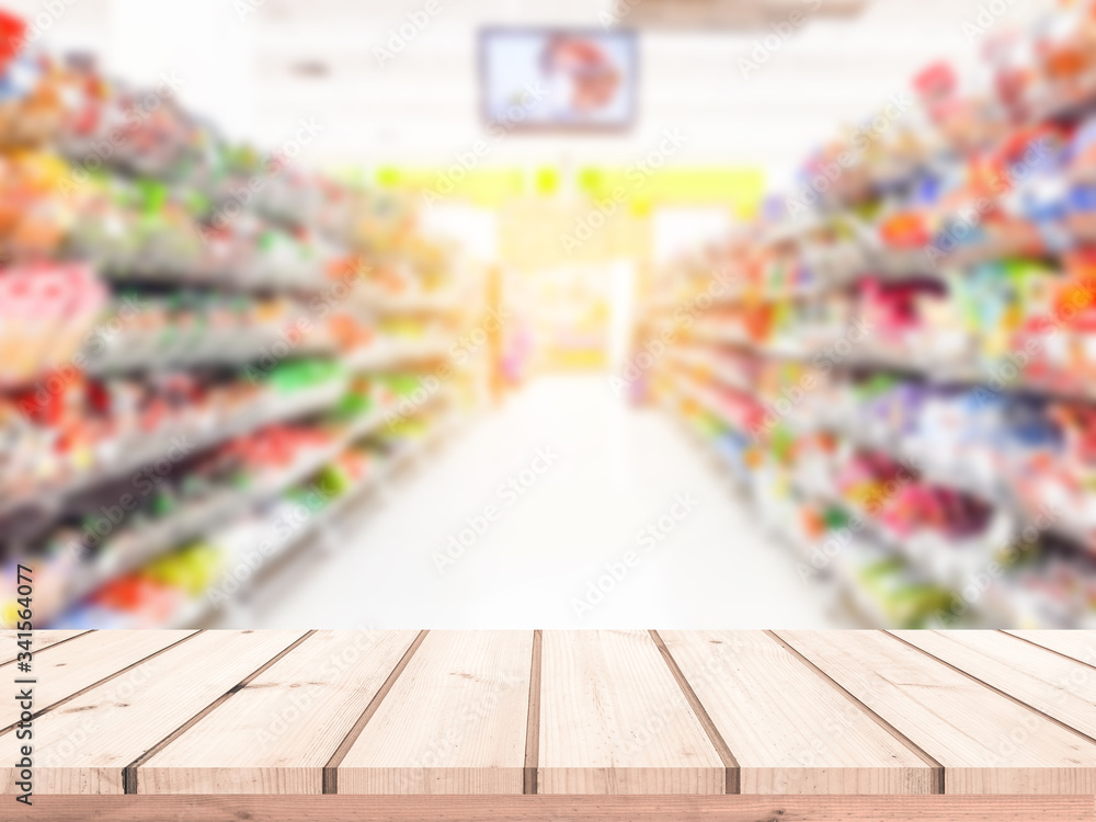Wood table or wood floor with supermarket blur background for Product display