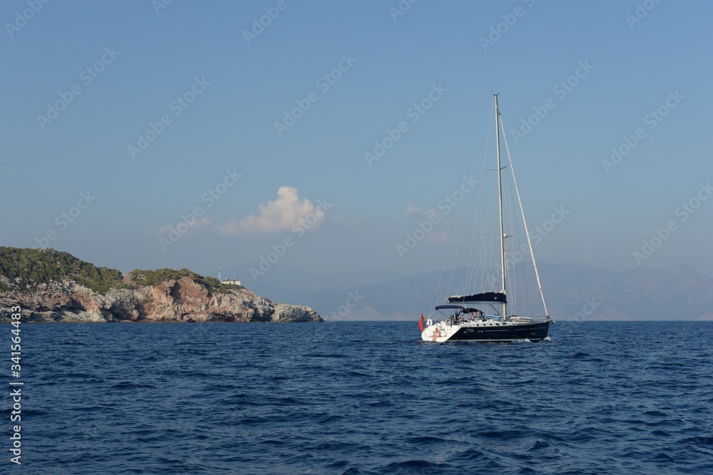 Yacht in the Aegean Sea near the Turkish city of Marmaris Yacht in the Aegean Sea near the Turkish city of Marmaris