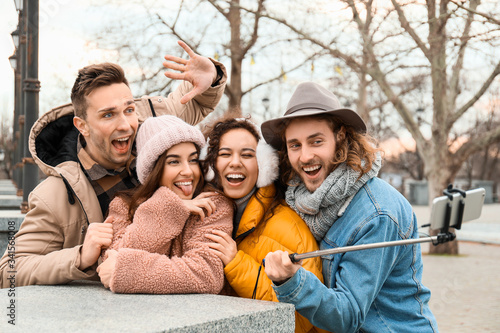 Happy friends taking selfie...