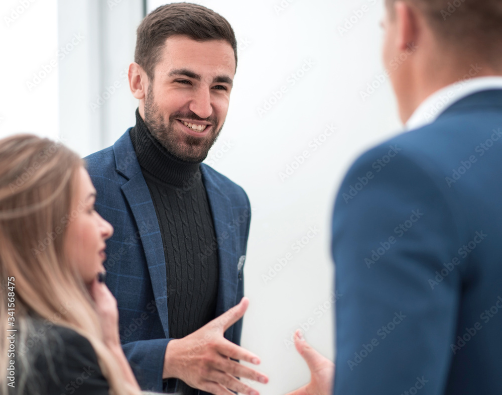 business partners holding out their hands for a handshake business partners holding out their hands for a handshake