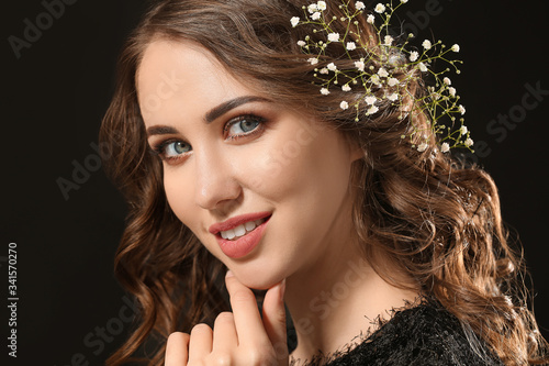 Beautiful young woman with ...