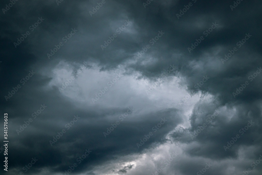 Storm clouds over the city. Leaden heavy clouds in the sky during cloudy weather. Beautiful views of the harsh sky Storm clouds over the city. Leaden heavy clouds in the sky during cloudy weather. Beautiful views of the harsh sky