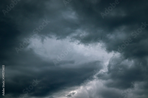 Storm clouds over the city. Leaden heavy clouds in the sky during cloudy weather. Beautiful views of the harsh sky