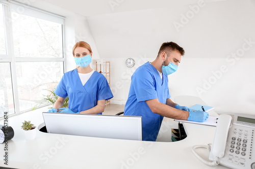 Receptionists working at de...