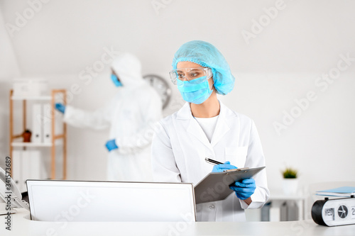 Female receptionist working...
