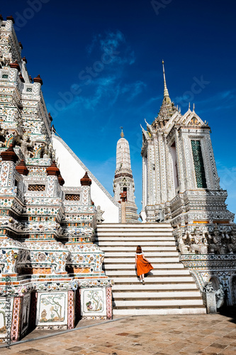 Photography Brown skirt girl With the Prang of Arun Temple, Wat arun Bangkok Thailand