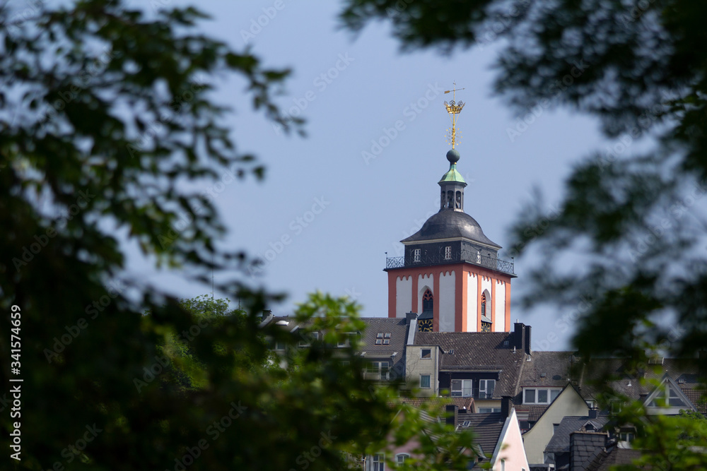 The landmark from Siegen city framed with threes in the Siegerland area