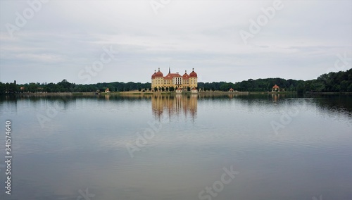 Moritzburg castle reflecting in the castle lake © pisces2386