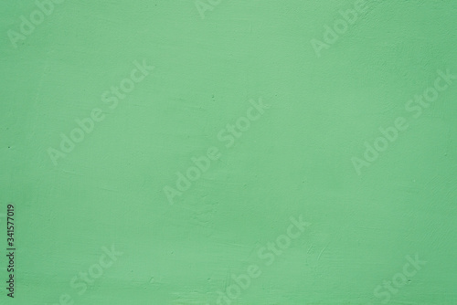 Green wall texture for background use. Pastel colors.