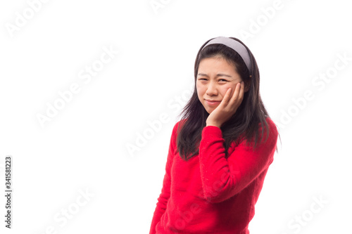 Full isolated studio picture from a young woman with toothache