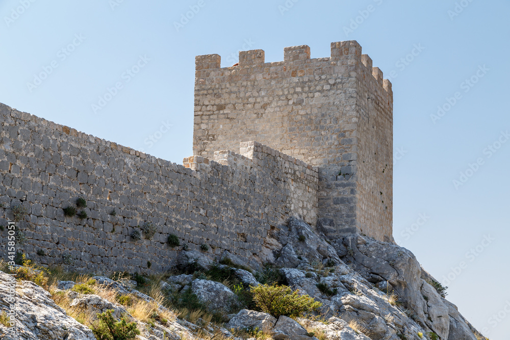 Medieval Starigrad Fortress standing above Omis town in Dalmatia, Croatia
