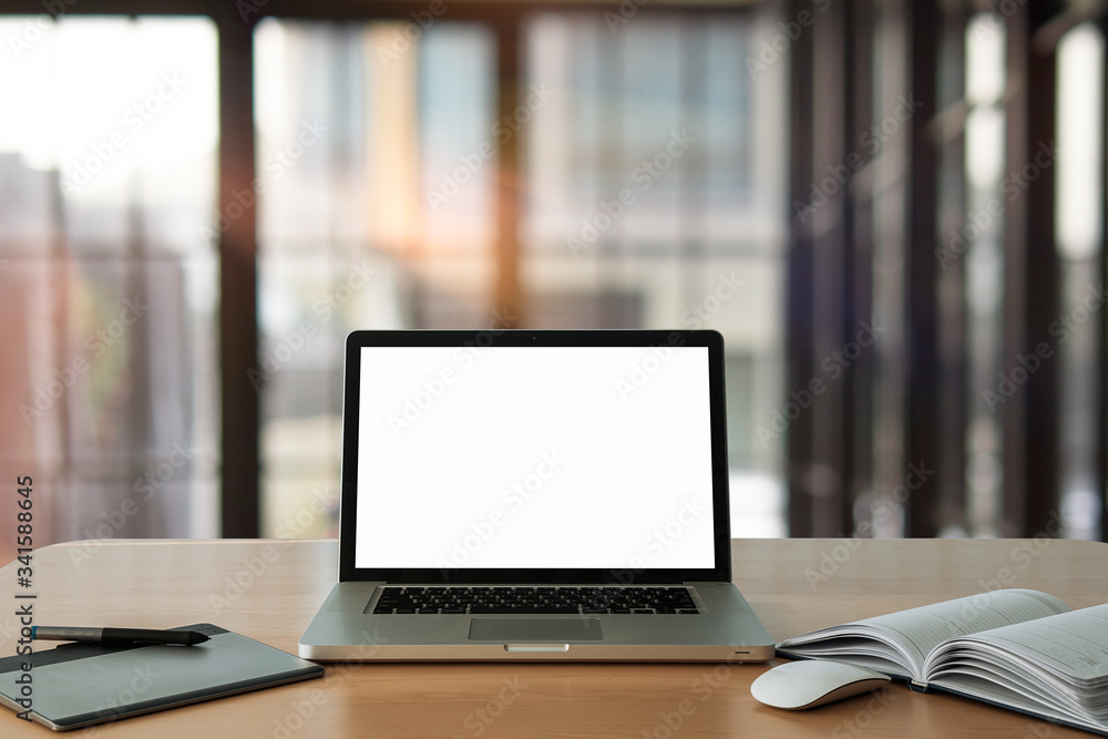Laptop with blank screen for product display on desk in home. Laptop with blank screen for product display on desk in home.