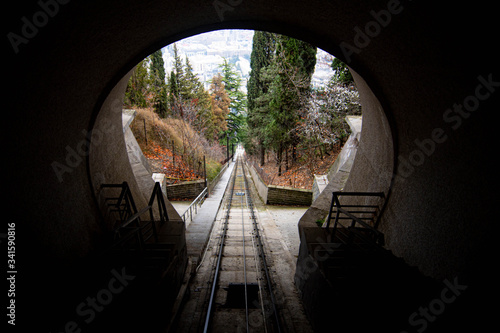 Fototapeta Naklejka Na Ścianę i Meble -  funicular to themepark view through hole