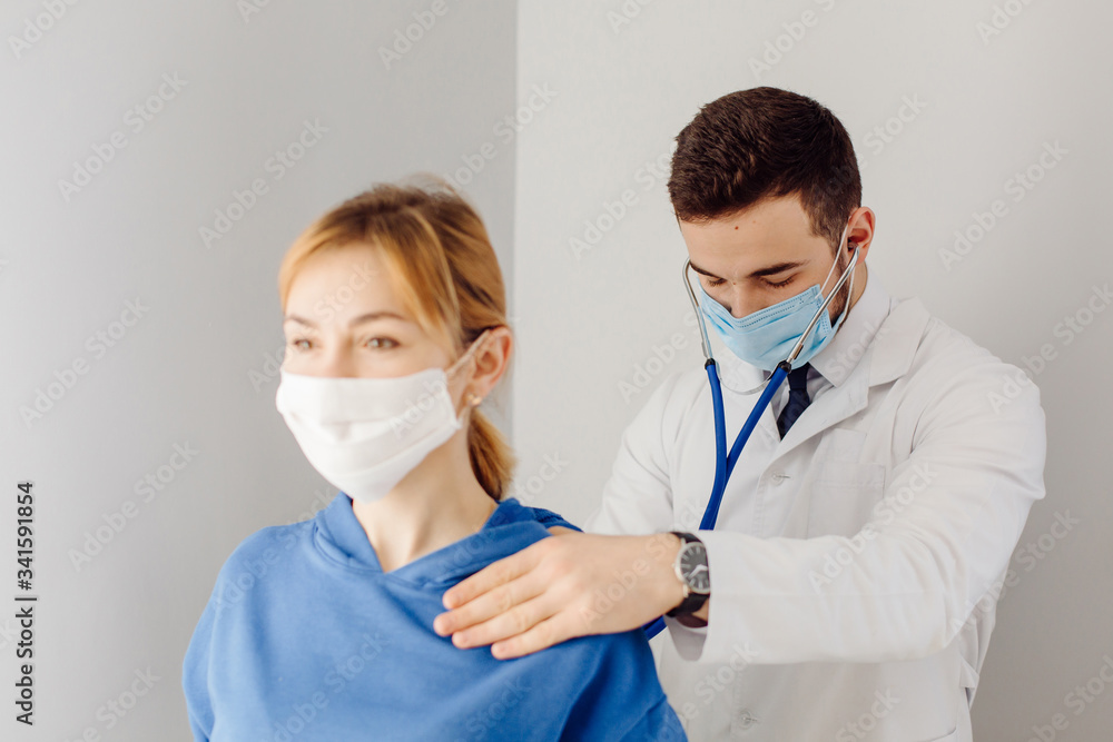 Doctor examines the patient . Medicine and health care concept.