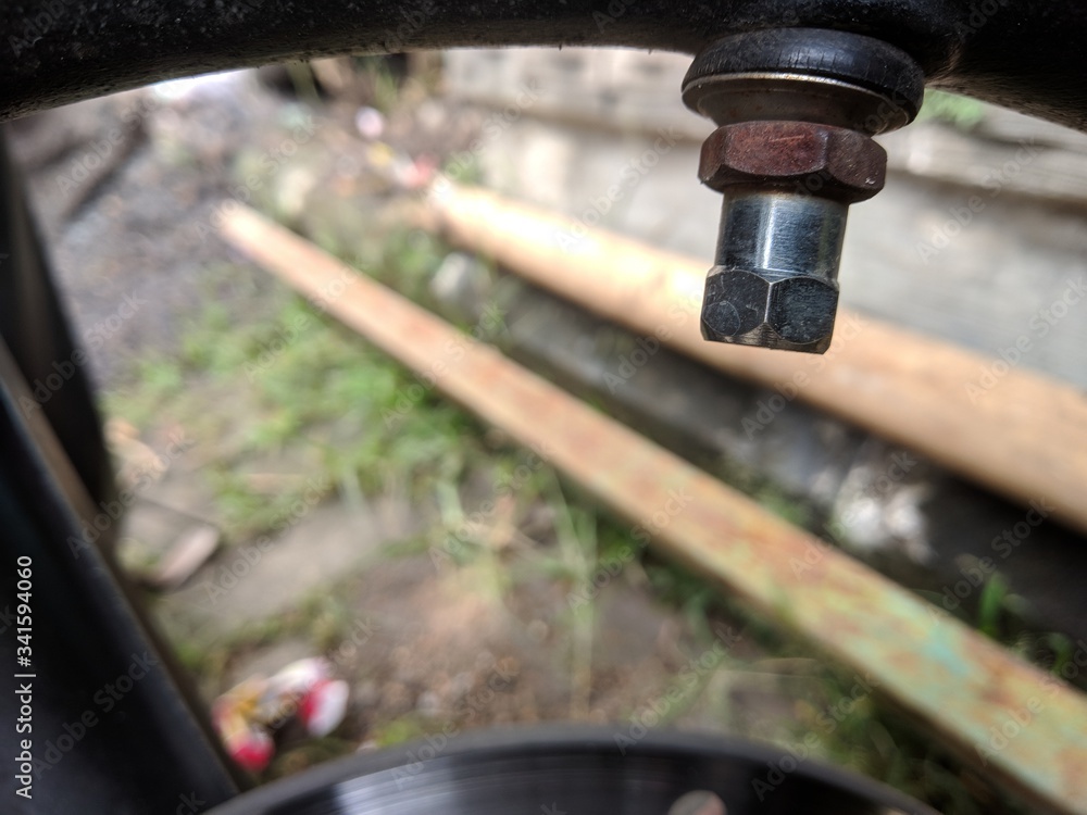 close the motorcycle tire valve. close the motorcycle tire valve.