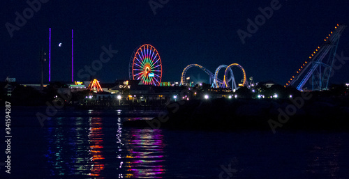 Jolly Roger Amusement Park in Ocean City, Maryland. The city It features miles of beach and a wooden boardwalk lined with restaurants, shops and hotels.