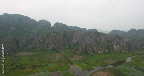 Aerial view Van Long Wetland Nature Reserve, Ninh Binh, Vietnam, called A Bay without waves, holds two national records for having the most Delacour langurs and largest unspoiled landscape in Vietnam photo