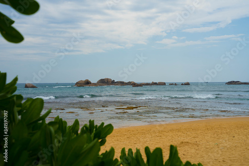 indian ocean with reefs and waves photo