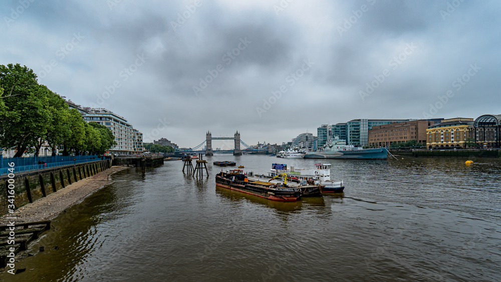 London view with Tower Bridge, City Hall, HMS Belfast and the River Thames and some ships in the foreground, England, Great Britain