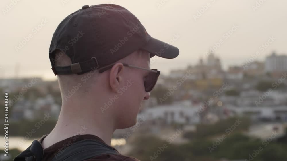 close-up of young blonde man enjoying the view in slow motion close-up of young blonde man enjoying the view in slow motion