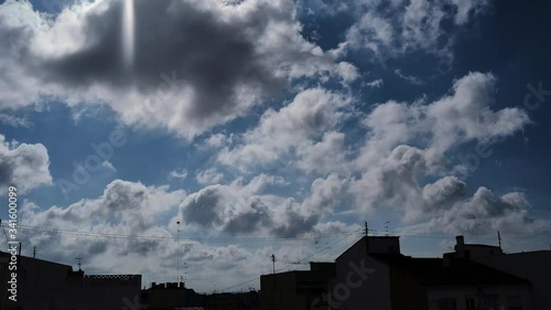 Timelapse 4k white clouds with blue sky in city Valencia, Spain.