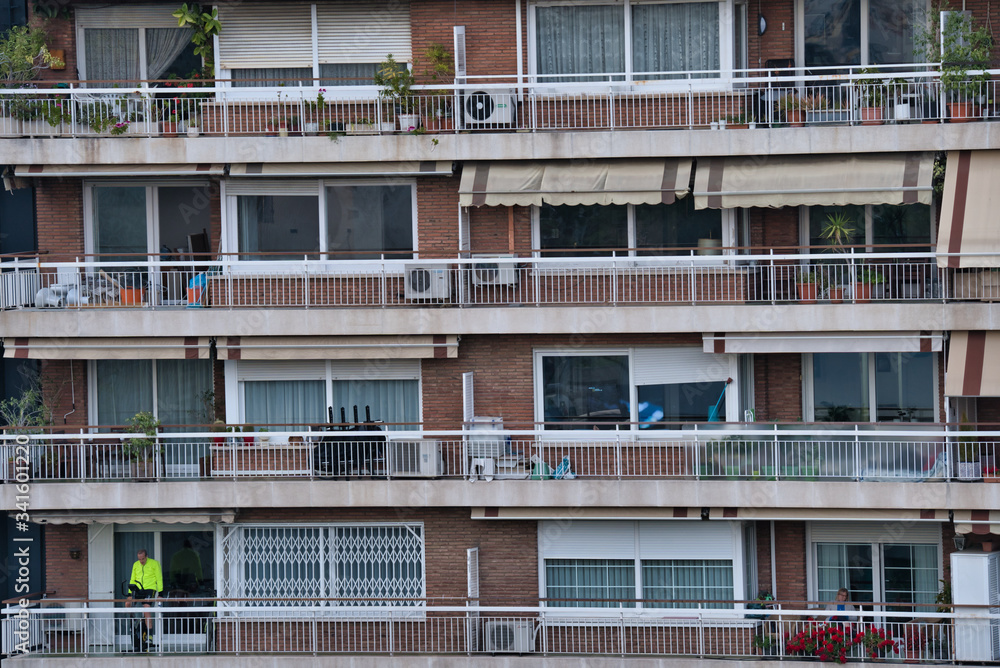People in balcony during covid-19 confinement. Spain People in balcony during covid-19 confinement. Spain