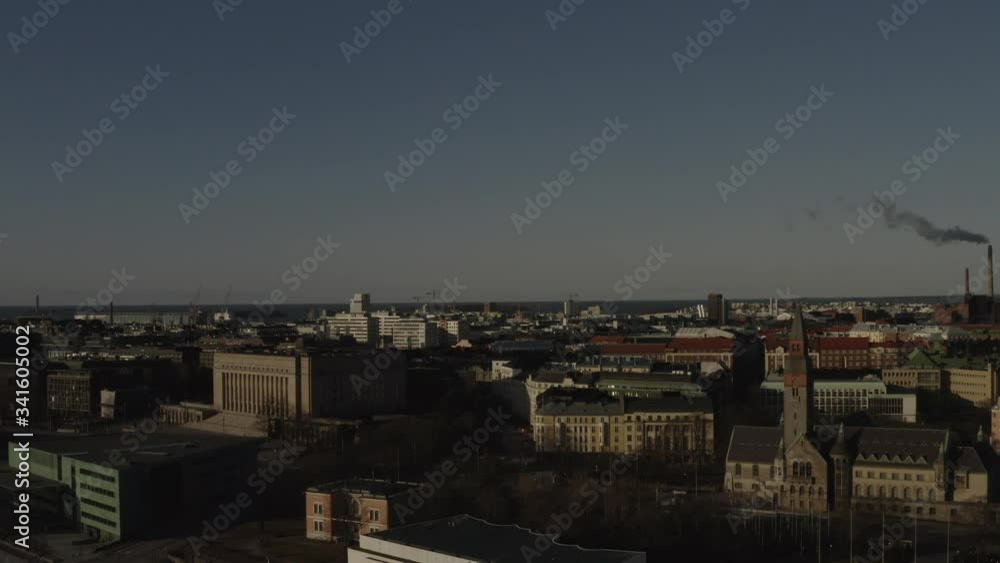 Aerial drone view of air pollution over city of Helsinki. Industrial chimney exhaust smoke. Aerial drone view of air pollution over city of Helsinki. Industrial chimney exhaust smoke.