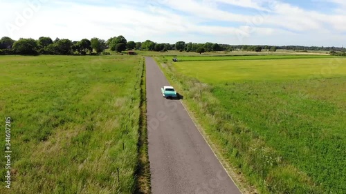 Drone circling Dodge Polara summer time, Öland, Sweden photo