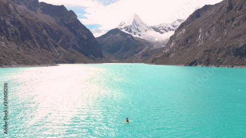 Paron lake reversal fly, couple kayakin in middle of the lake, aerial shoot photo