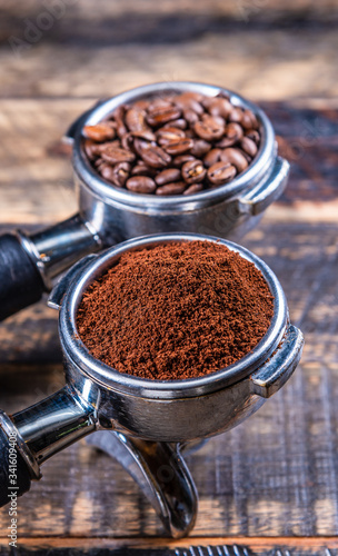 Wallpaper Mural Ground beans in a Coffee machine Coffee handle Filter Holder on a wooden table Torontodigital.ca