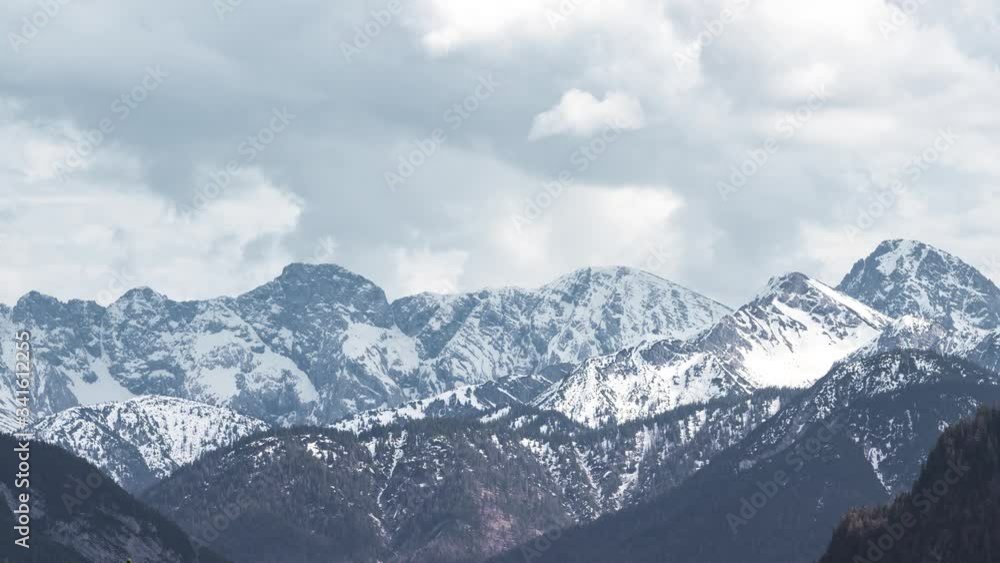 Breathtaking time lapse of mountain peaks in the clouds. Beautiful view of clouds moving over the peaks of the German Alps Breathtaking time lapse of mountain peaks in the clouds. Beautiful view of clouds moving over the peaks of the German Alps