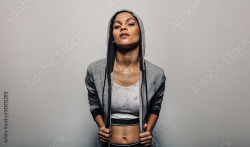 Fit woman wearing a hoodie sportwear photo