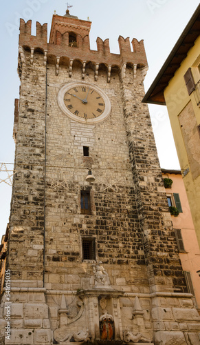 The Pallata tower, symbol of the city of Brescia, Italy. Medieval monument built in 1248. photo