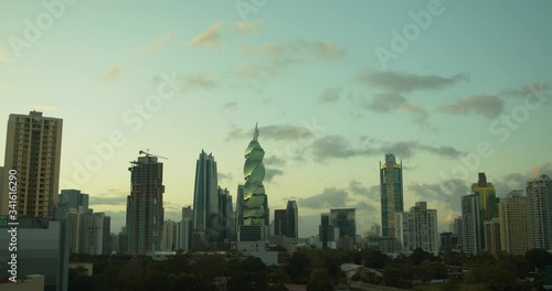 Epic timelapse of day to night of the Panama City skyline with F & F tower in the foreground photo