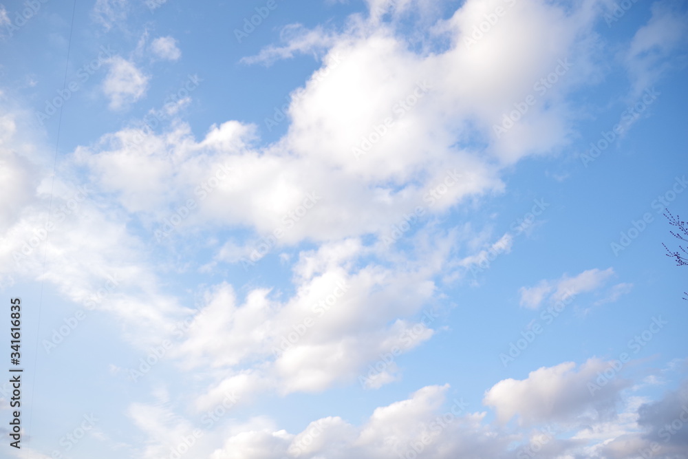 Clear blue sky and white clouds summer background Clear blue sky and white clouds summer background