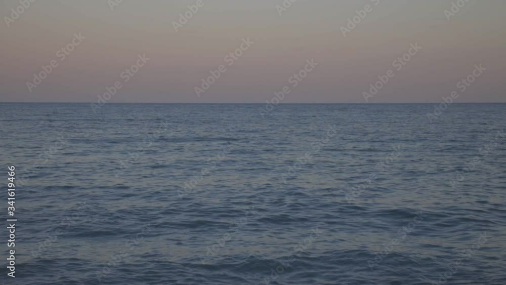 Sunset Over The Calm Ocean.- wide shot Sunset Over The Calm Ocean.- wide shot