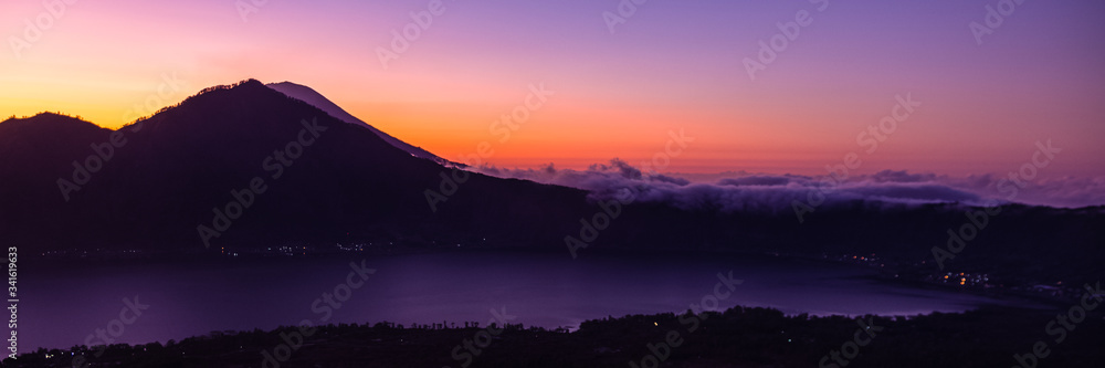 Sunrise panorama view from top of Batur volcano Sunrise panorama view from top of Batur volcano
