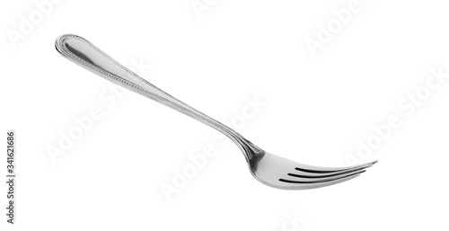 Steel spoon and fork isolated on white background.