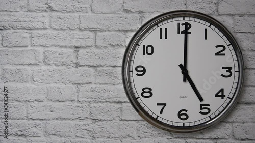 Wallpaper Mural The Time On The Clock Five. Clock With The Black Arrows With The Arabic Numerals On An White Brick Wall Background On The Right Side. Torontodigital.ca