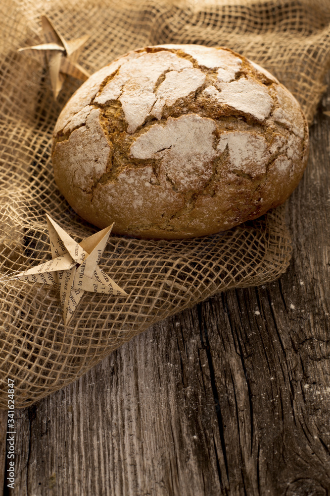 homemade fresh bread on a wooden table