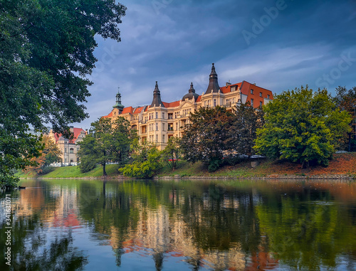 Epic palace behind river in stormy day in Wroclaw City