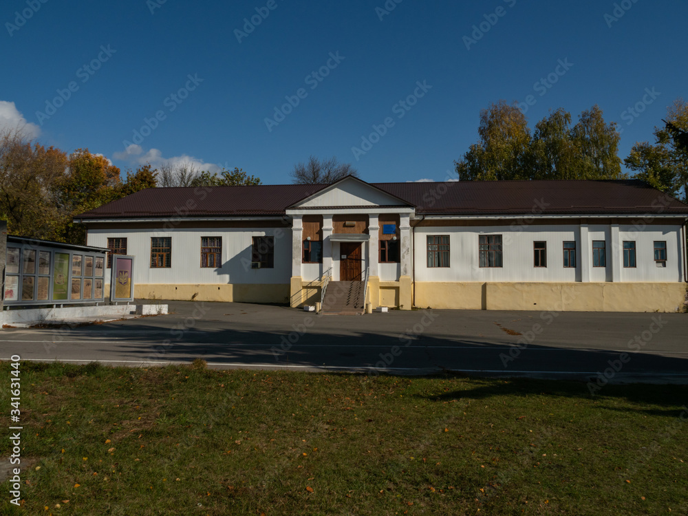 Building next to the monument of Lenin in Chernobyl town. Exclusion zone, Ukraine. Building next to the monument of Lenin in Chernobyl town. Exclusion zone, Ukraine.
