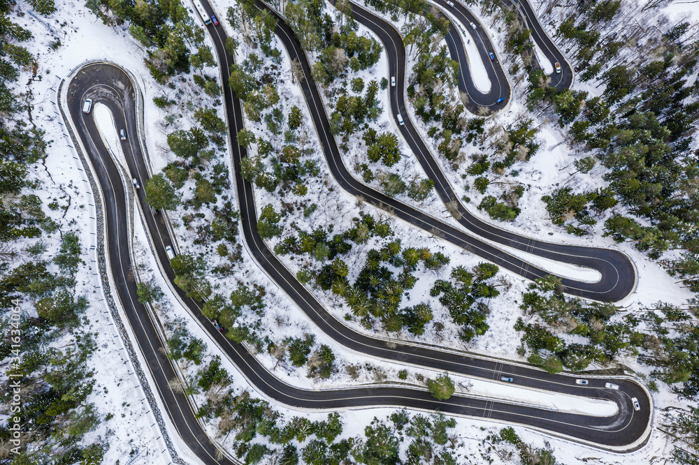 Aerial view of a car serpentine on a mountain Aerial view of a car serpentine on a mountain