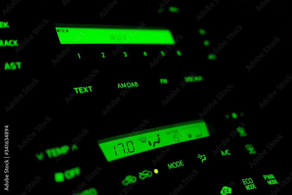 light from the radio inside the car in the dark