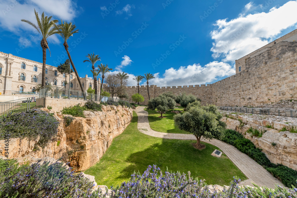 Medieval wall of fortress in Jerusalem -  the capital of Israel and major tourist sacred place in the Middle East and in all around of the world